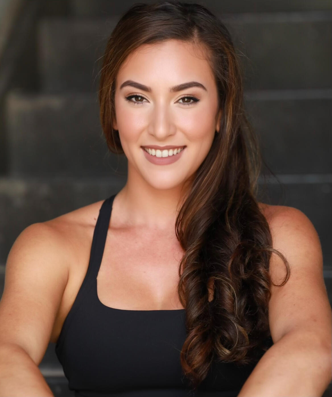 Cori headshot Headshot of about coach cori